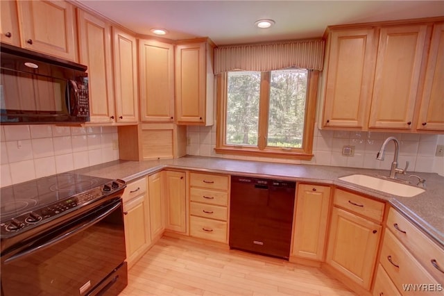 7 Forsythia Ct, Orchard Park, NY 14127 - kitchen with black appliances, a sink, light brown cabinets, decorative backsplash, and recessed lighting