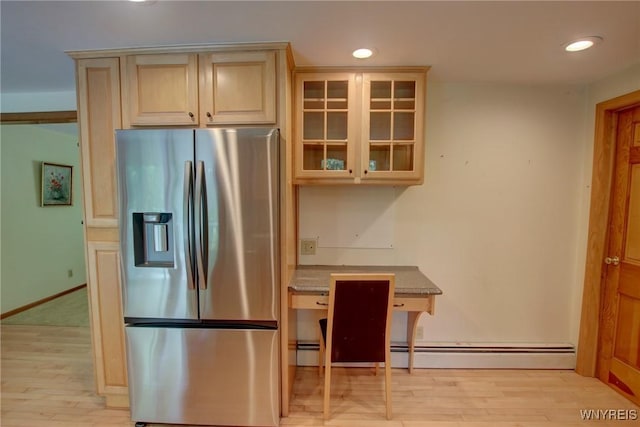 7 Forsythia Ct, Orchard Park, NY 14127 - kitchen with stainless steel fridge with ice dispenser, light wood-style floors, glass insert cabinets, recessed lighting, and a baseboard radiator
