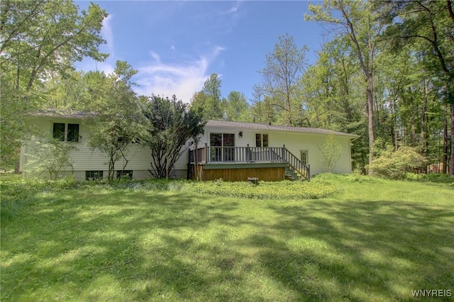7 Forsythia Ct, Orchard Park, NY 14127 - rear view of property with a wooden deck and a lawn