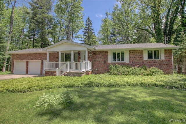 7 Forsythia Ct, Orchard Park, NY 14127 - ranch-style home featuring a garage, covered porch, brick siding, and a front lawn
