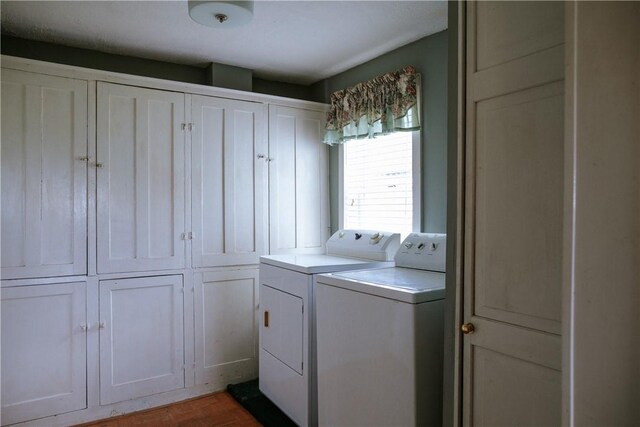 2400 Gladstone Hollow Rd, Andes, NY 13731 - washroom featuring washer and clothes dryer, cabinet space, and wood finished floors