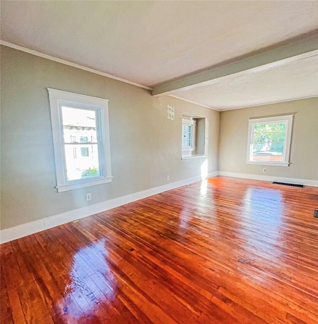 561 Post St, Elmira-City, NY 14904 - unfurnished room with hardwood / wood-style flooring, beam ceiling, baseboards, and crown molding