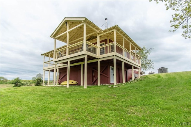 4146 Carleton Island Rd Unit 1, Cape Vincent, NY 13618 - rear view of house featuring a lawn and a deck