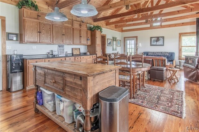 4146 Carleton Island Rd Unit 1, Cape Vincent, NY 13618 - kitchen with light wood-style floors, open floor plan, a center island, and wood ceiling