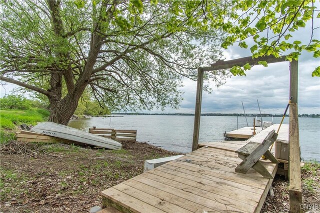 4146 Carleton Island Rd Unit 1, Cape Vincent, NY 13618 - dock area with a water view