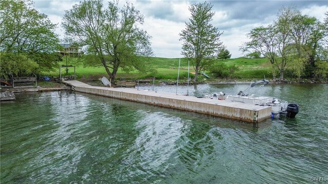 4146 Carleton Island Rd Unit 1, Cape Vincent, NY 13618 - dock area with a water view