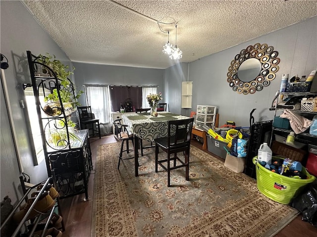 104 Newcomb St, Rochester, NY 14609 - dining room featuring wood finished floors and a textured ceiling