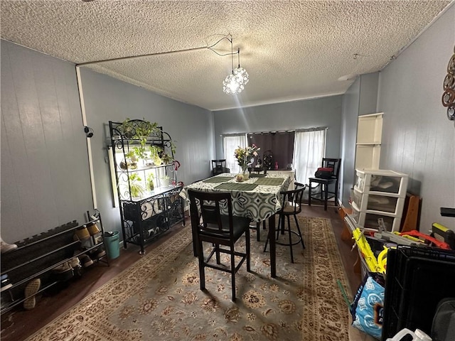 104 Newcomb St, Rochester, NY 14609 - dining space featuring wood finished floors and a textured ceiling