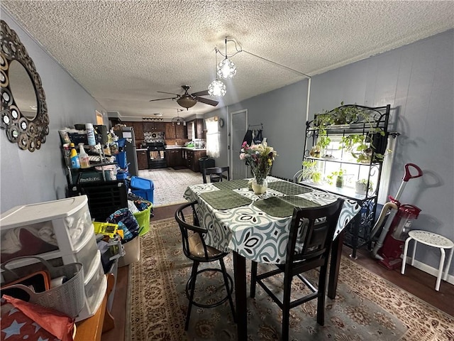 104 Newcomb St, Rochester, NY 14609 - dining room with a ceiling fan, a textured ceiling, and light wood finished floors