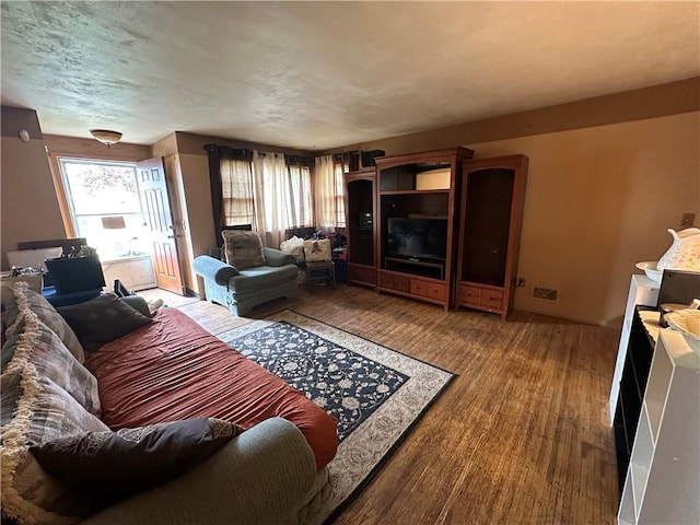 104 Newcomb St, Rochester, NY 14609 - living area with plenty of natural light and wood finished floors