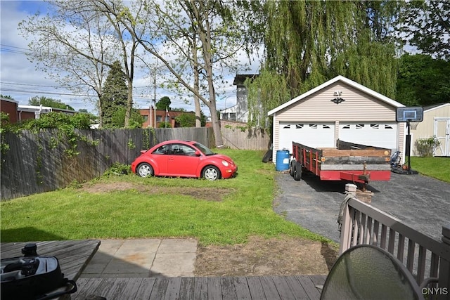 308 State St, Auburn, NY 13021 - view of yard featuring an outdoor structure and a detached garage