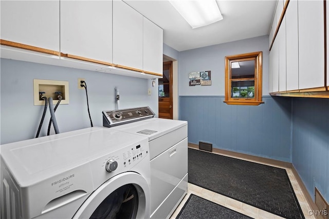 114 E Dauenhauer St, Manlius, NY 13057 - washroom with cabinet space, independent washer and dryer, a wainscoted wall, and wooden walls