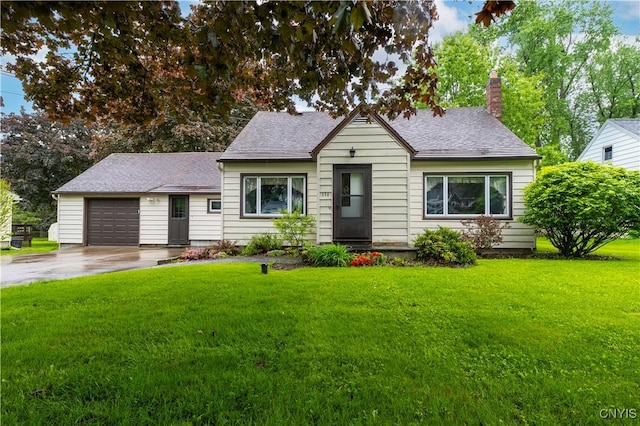 114 E Dauenhauer St, Manlius, NY 13057 - view of front of home featuring concrete driveway, a front lawn, a garage, a chimney, and roof with shingles