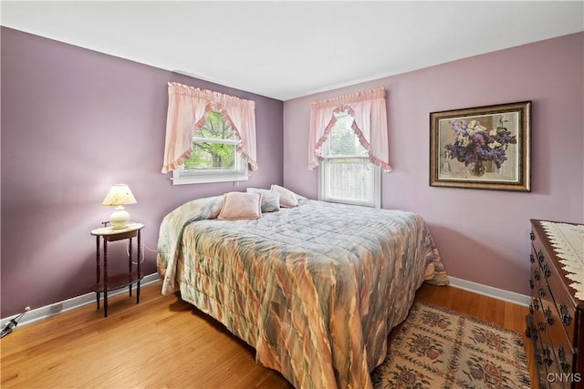 114 E Dauenhauer St, Manlius, NY 13057 - bedroom with baseboards and wood finished floors