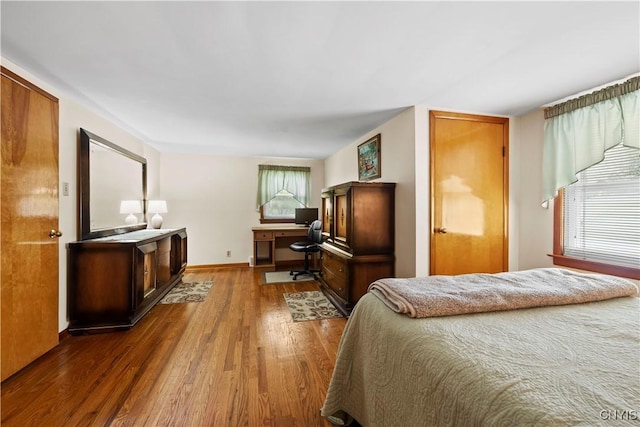 114 E Dauenhauer St, Manlius, NY 13057 - bedroom with wood finished floors and baseboards