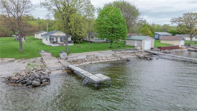 2510 Ponds Shore Dr, Cape Vincent, NY 13618 - dock area featuring a boat ramp, a water view, and a yard