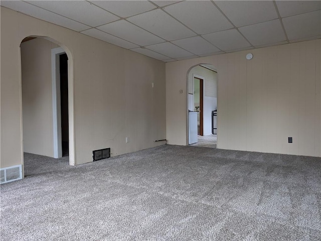 56 Aurora Ave, West Seneca, NY 14224 - unfurnished room featuring carpet, arched walkways, and a paneled ceiling