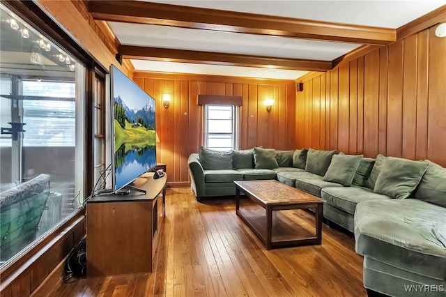 18 Spruce St, Lockport-City, NY 14094 - living area featuring beamed ceiling, wood-type flooring, and wooden walls