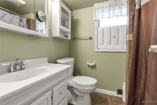 18 Spruce St, Lockport-City, NY 14094 - bathroom featuring vanity, toilet, tile patterned floors, a shower with curtain, and baseboards