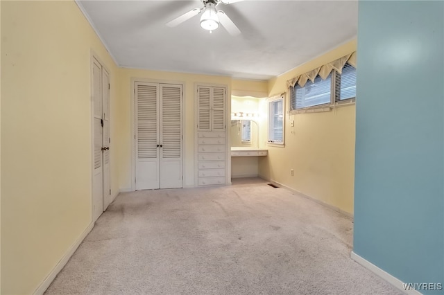 18 Spruce St, Lockport-City, NY 14094 - unfurnished bedroom featuring carpet, baseboards, and ceiling fan