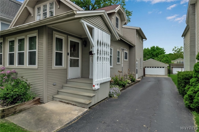 18 Spruce St, Lockport-City, NY 14094 - bungalow with a garage and an outdoor structure