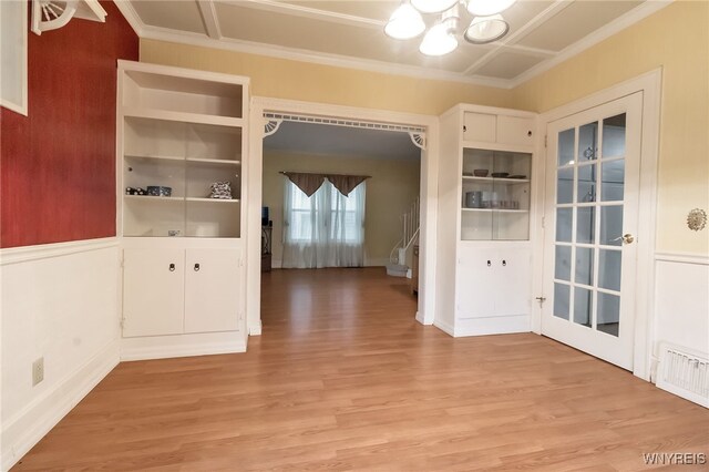 18 Spruce St, Lockport-City, NY 14094 - unfurnished dining area with a chandelier, light wood finished floors, crown molding, and baseboards