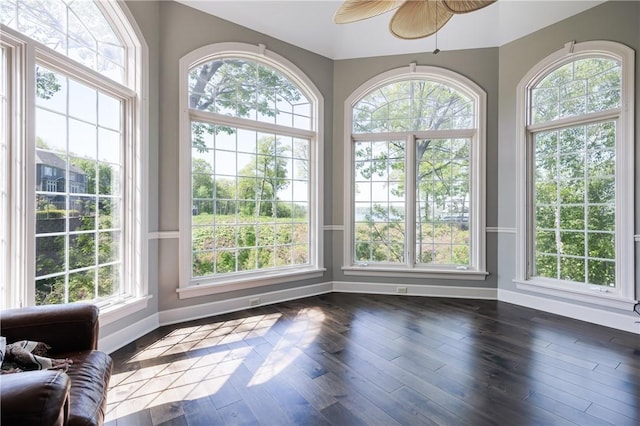 411 Sundance Trl, Webster, NY 14580 - unfurnished sunroom with baseboards and wood finished floors