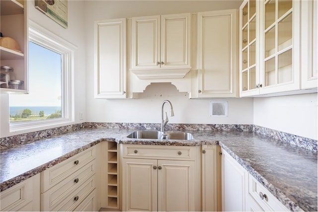 411 Sundance Trl, Webster, NY 14580 - kitchen featuring a sink and glass insert cabinets