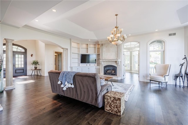 411 Sundance Trl, Webster, NY 14580 - living area with decorative columns, plenty of natural light, arched walkways, recessed lighting, and crown molding