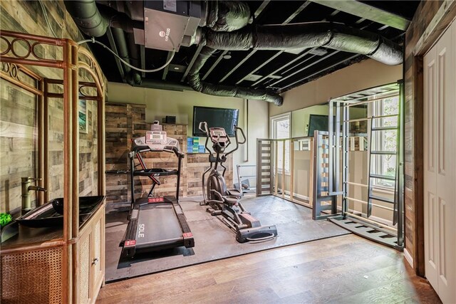 411 Sundance Trl, Webster, NY 14580 - workout room with wood finished floors