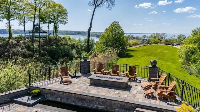 411 Sundance Trl, Webster, NY 14580 - view of patio / terrace with an outdoor fire pit and a water view