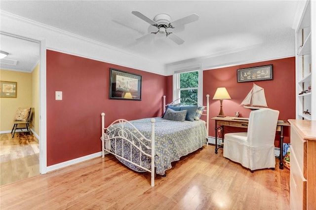 1338 Summit Rd, Foster Town, PA 16744 - bedroom with ornamental molding, wood finished floors, ceiling fan, and baseboard heating