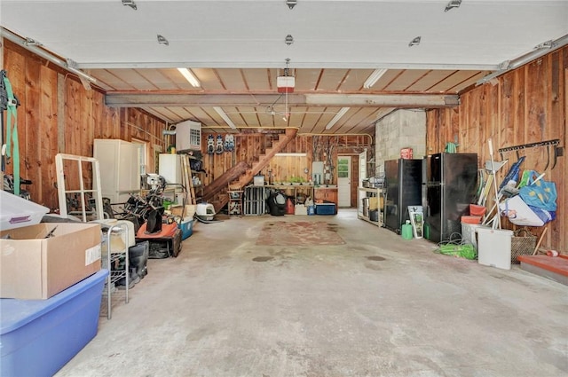 1338 Summit Rd, Foster-Town, PA 16744 - garage with wood walls and freestanding refrigerator