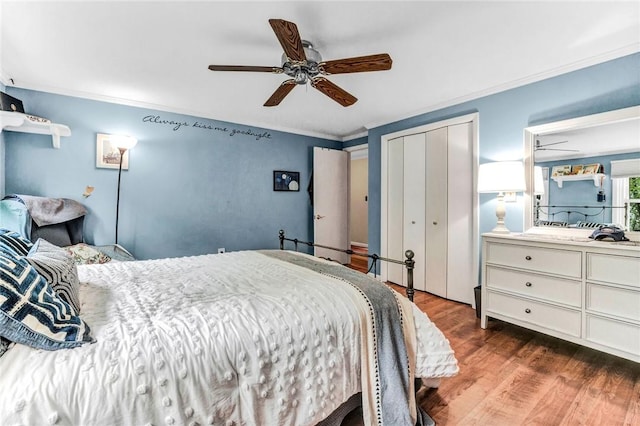 1338 Summit Rd, Foster-Town, PA 16744 - bedroom with dark wood-style flooring, a closet, a ceiling fan, and crown molding