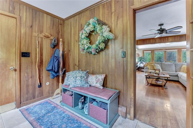1338 Summit Rd, Foster-Town, PA 16744 - mudroom with wooden walls, ceiling fan, and crown molding