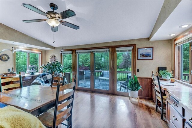 1338 Summit Rd, Foster Town, PA 16744 - dining space with wood finished floors, a ceiling fan, lofted ceiling, and wainscoting