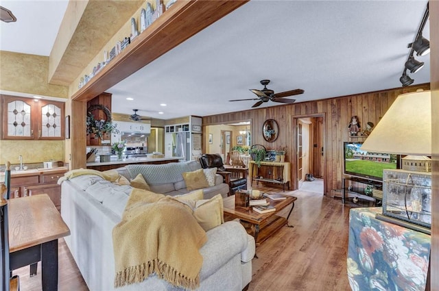 1338 Summit Rd, Foster-Town, PA 16744 - living area with ceiling fan, wood walls, and wood finished floors