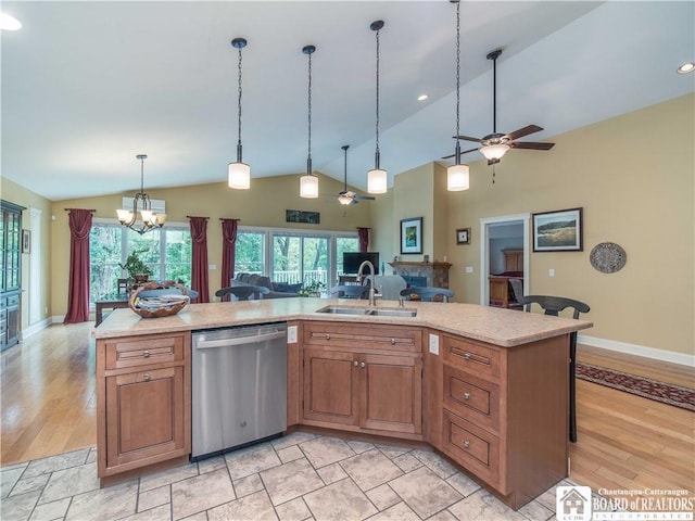 285 Porter Rd, Pomfret, NY 14063 - kitchen with stainless steel dishwasher, a ceiling fan, lofted ceiling, a sink, and brown cabinetry