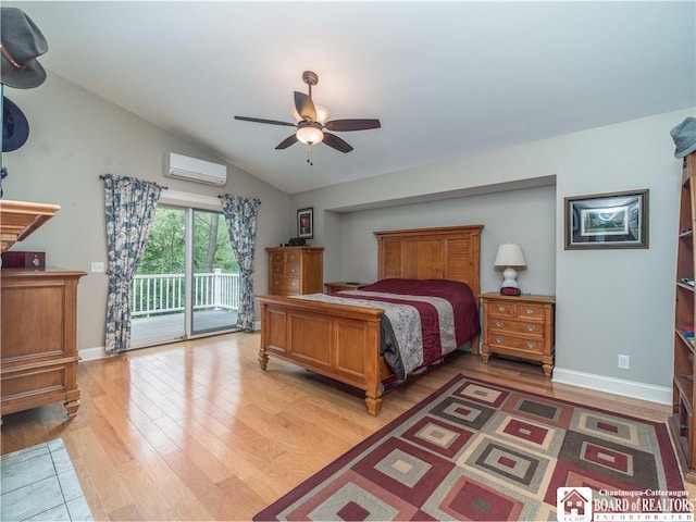 285 Porter Rd, Pomfret, NY 14063 - bedroom featuring an AC wall unit, access to outside, light wood-style flooring, baseboards, and lofted ceiling
