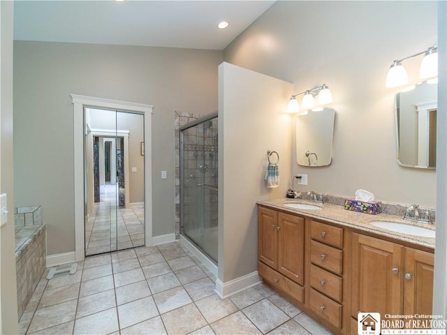 285 Porter Rd, Pomfret, NY 14063 - bathroom featuring double vanity, a shower stall, recessed lighting, tile patterned floors, and baseboards