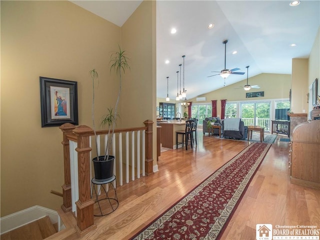 285 Porter Rd, Pomfret, NY 14063 - corridor with light wood-style flooring, high vaulted ceiling, and recessed lighting