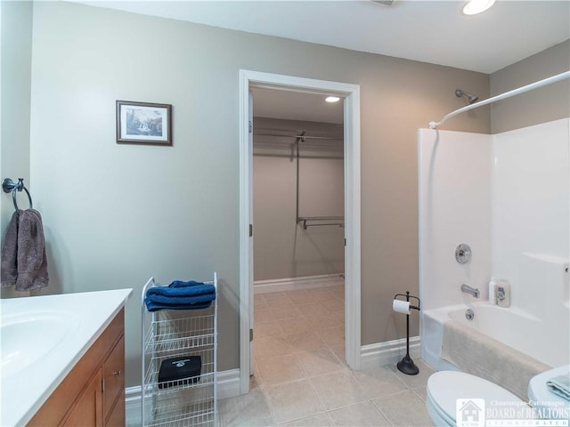 285 Porter Rd, Pomfret, NY 14063 - full bathroom featuring shower / washtub combination, vanity, toilet, baseboards, and a spacious closet
