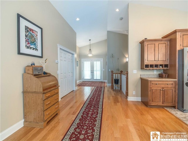 285 Porter Rd, Pomfret, NY 14063 - hall with high vaulted ceiling, light wood-style floors, baseboards, and recessed lighting