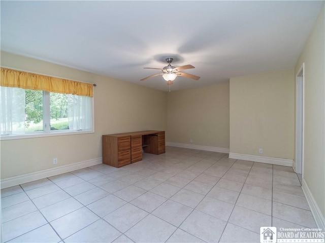 285 Porter Rd, Pomfret, NY 14063 - empty room featuring a ceiling fan, light tile patterned floors, and baseboards
