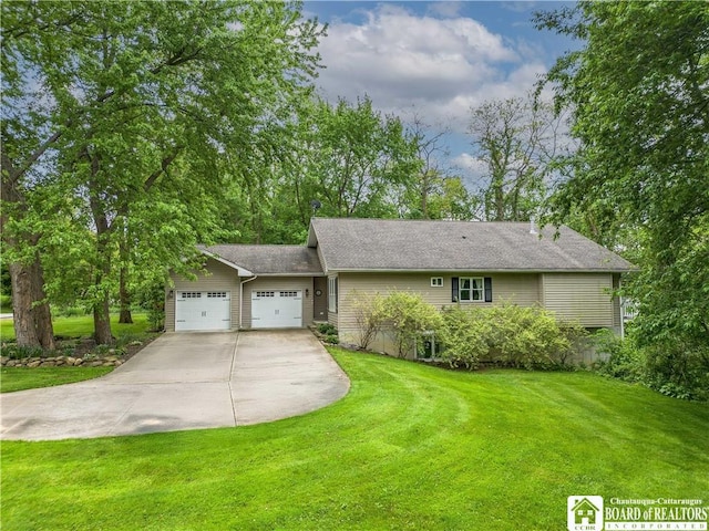 285 Porter Rd, Pomfret, NY 14063 - view of front facade featuring concrete driveway, an attached garage, and a front yard