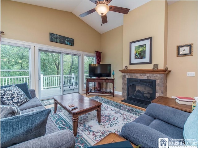 285 Porter Rd, Pomfret, NY 14063 - living room featuring a ceiling fan, wood finished floors, a fireplace, baseboards, and high vaulted ceiling