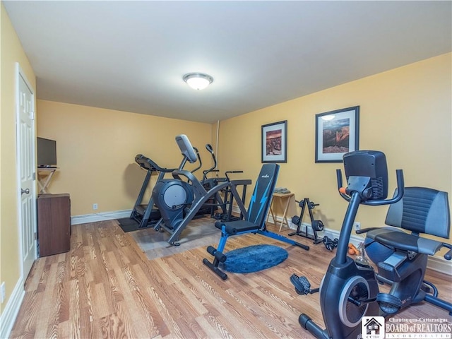 285 Porter Rd, Pomfret, NY 14063 - workout room with wood finished floors and baseboards