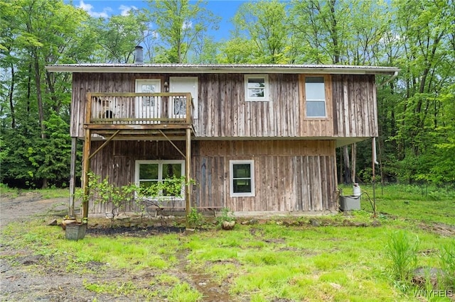 12353 Planck Rd, Perrysburg, NY 14129 - back of house featuring metal roof and a balcony