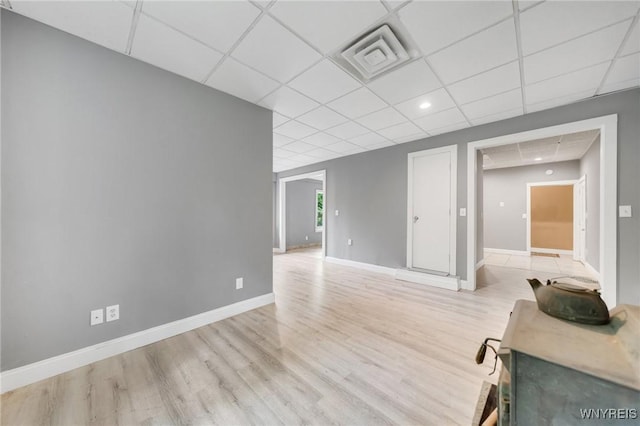 12353 Planck Rd, Perrysburg, NY 14129 - spare room with light wood-style flooring, a drop ceiling, baseboards, and recessed lighting
