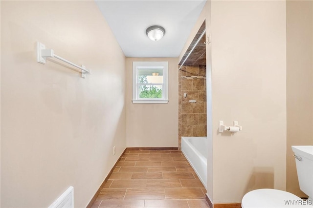 12353 Planck Rd, Perrysburg, NY 14129 - full bath featuring toilet,  shower combination, and baseboards